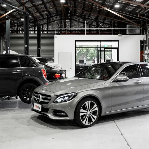 Mercedes-Benz and BMW vehicles in European car service workshop Brisbane