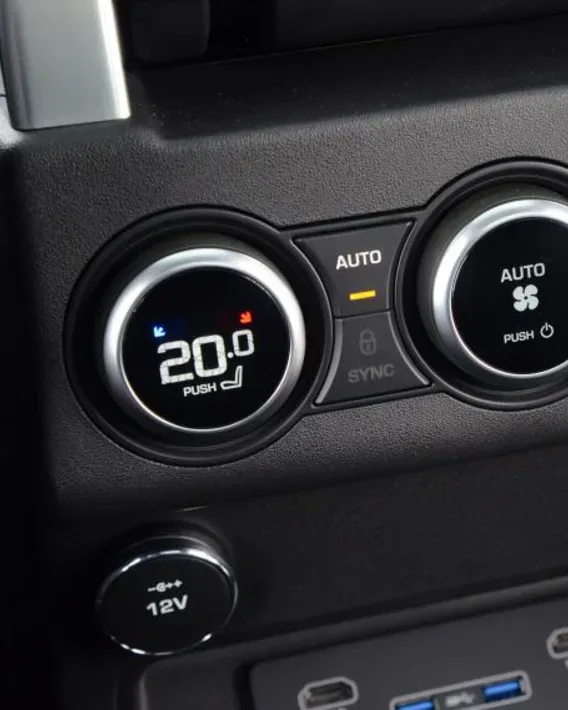 European car air conditioning controls showing temperature display and AUTO climate settings