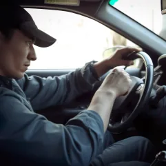 European car driver conducting road test after Brisbane automotive service